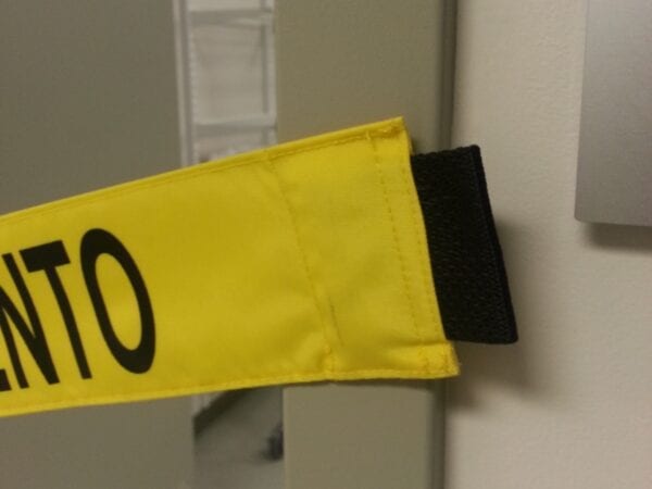 A close-up shot of the yellow banner corners